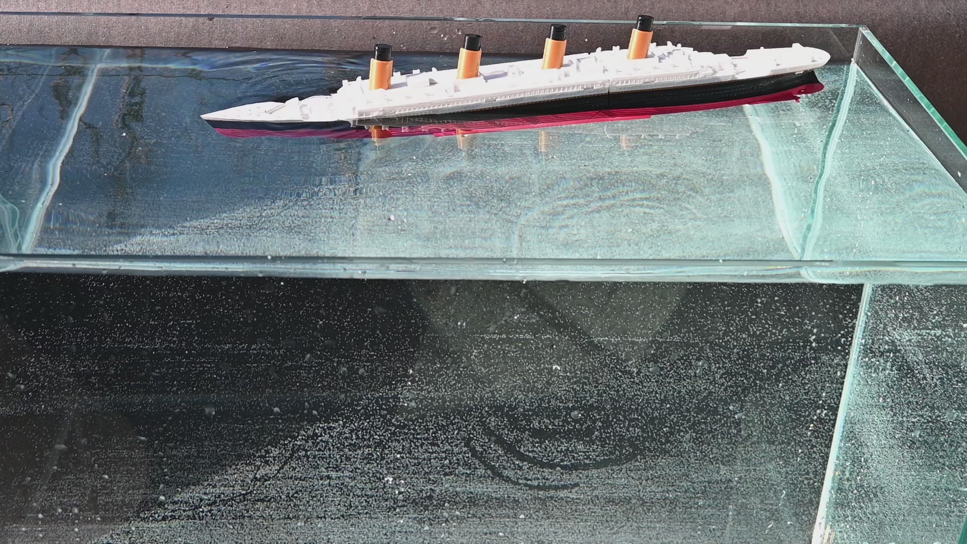 Titanic toy ship that breaks store in half