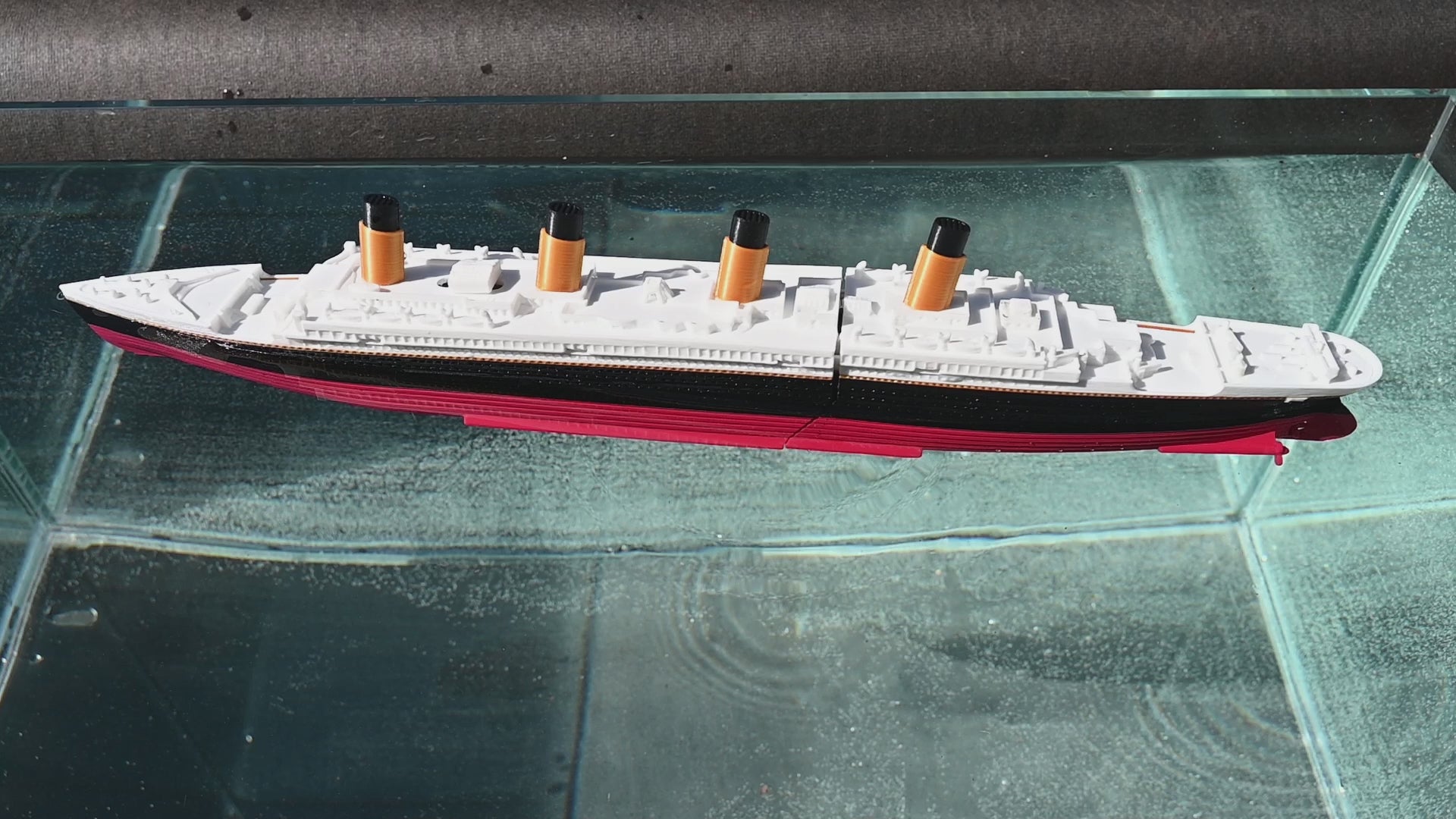 The submersible Starlight Edition Titanic Model floats - with detail and music.